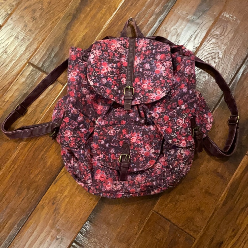 Candie’s Pink & Brown Floral Backpack w/Leather Bottom/Straps & Snap Closure.